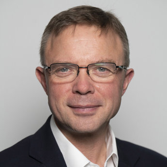 A head and shoulders portrait photograph of RCR president Stephen Harding