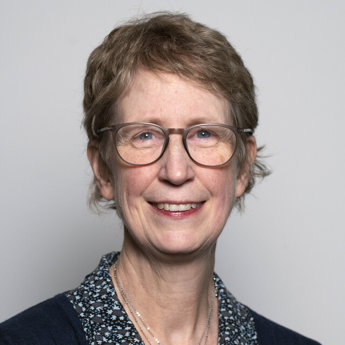 A head and shoulders portrait of Dr Louise Hanna