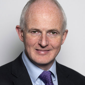 A head and shoulders portrait of Dr Robin Proctor